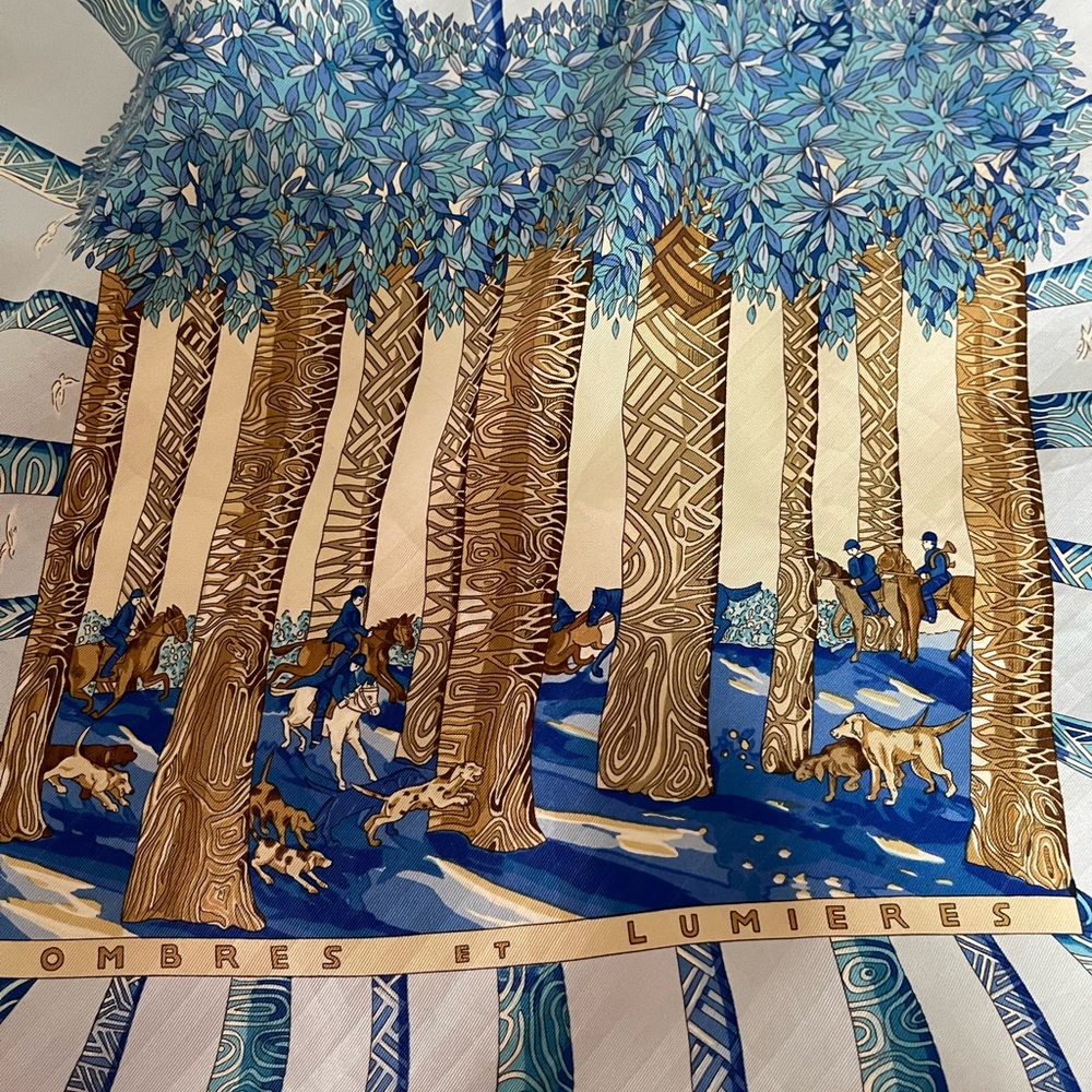 Hermès Ombré Et Lumieres Light Blue And Gold Patterned Silk Scarf.